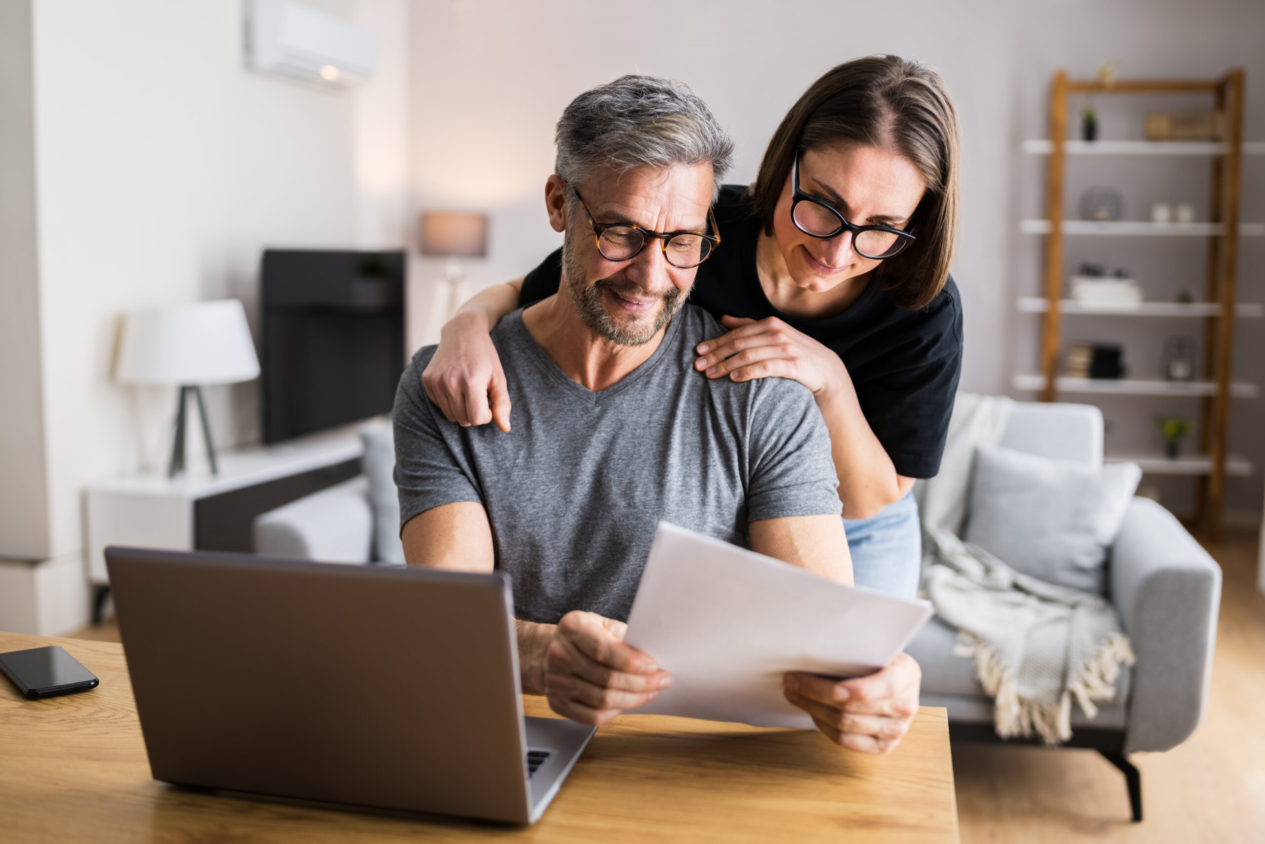 Couple,Doing,Taxes,And,Family,Budget,On,Computer