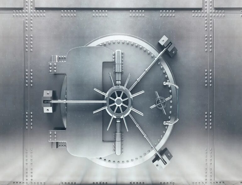 A close-up of a secure bank vault door with the words "Financial Strength" and "Strength and Security."