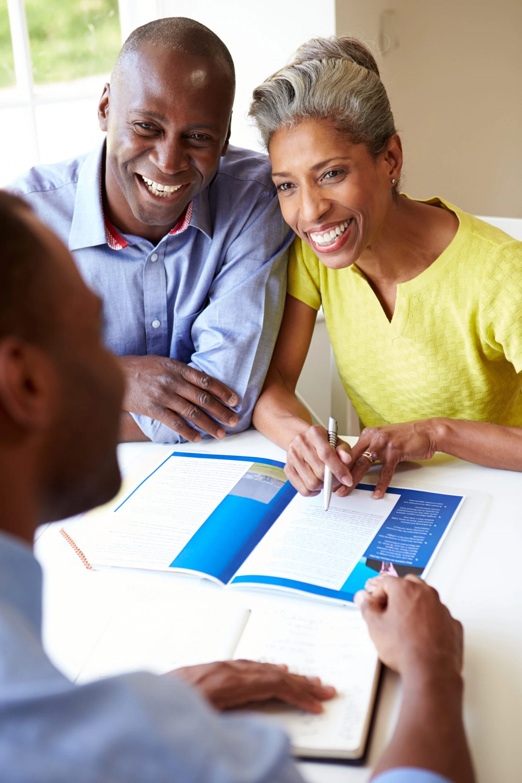 Black couple meeting with fiancial advisor dreamstime_xxl_35612487